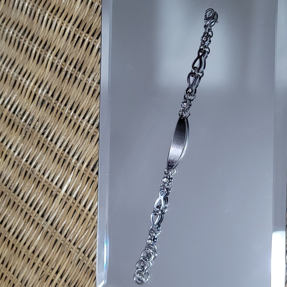 Stainless steel bracelet with two stones of each side engravable plate like new - Picture 2 of 5